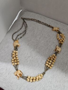 Bovine Bone & Silver Tone Beaded Necklace With Elephant Pendants.